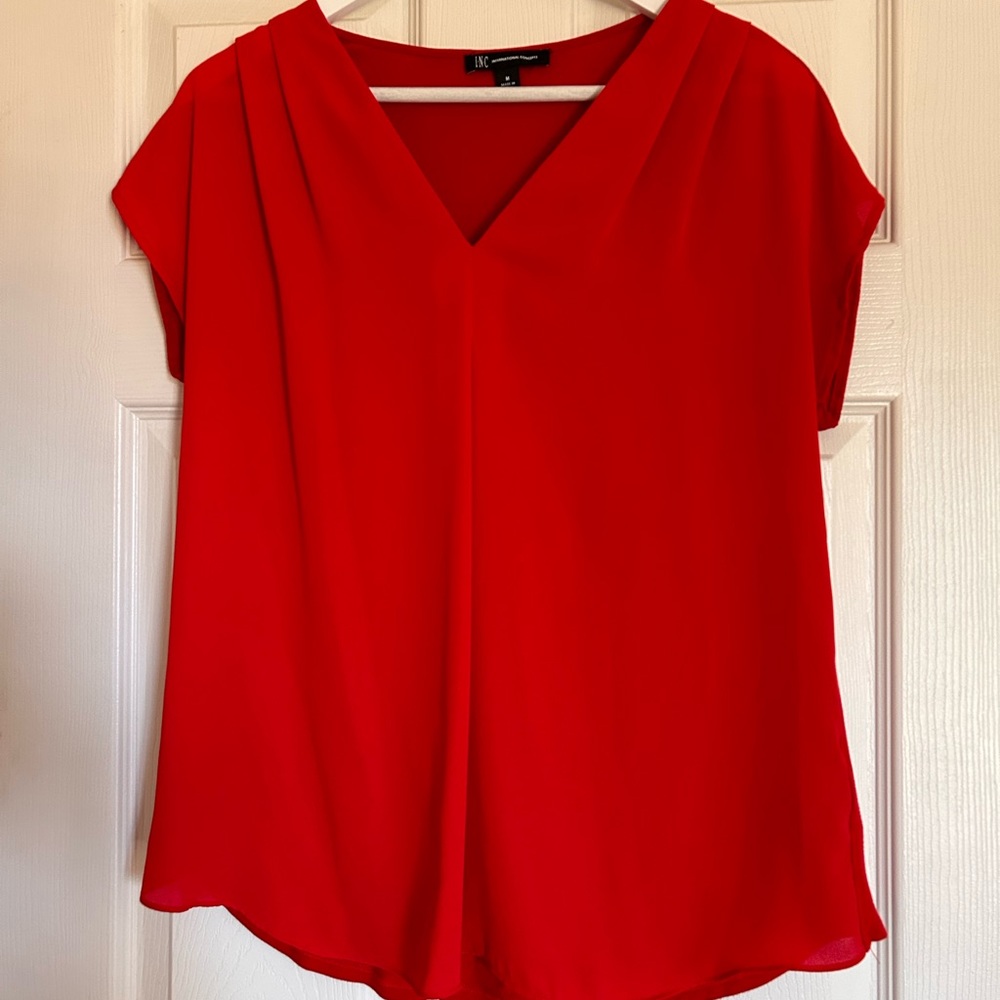 INC. Size M. Red top.